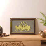 Load image into Gallery viewer, Decorative wall art with horses and a sun on a wooden shelf.