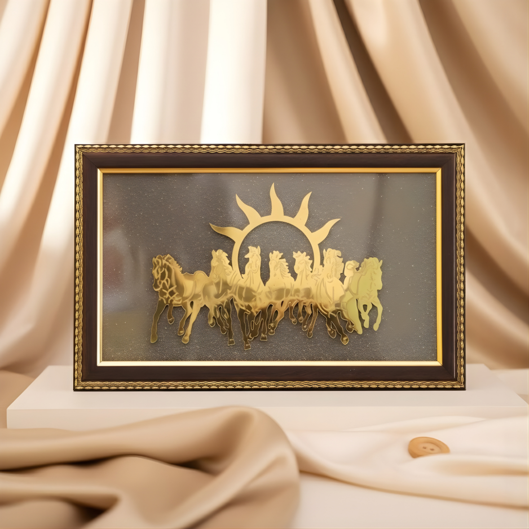 Decorative wall art with a gold sun and horse design on a black background, framed in gold, against a beige curtain.