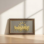 Load image into Gallery viewer, Decorative wall art with a silhouette of a city skyline and sun in a wooden frame on a light background.